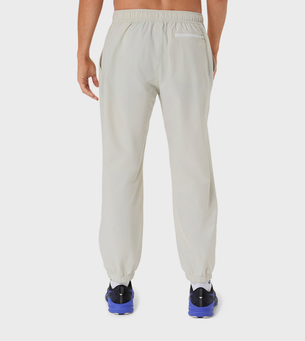 Asics Sportswear - Off White Track Pants & Joggers
