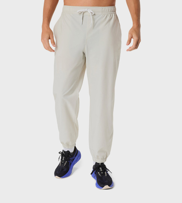 Asics Sportswear - Off White Track Pants & Joggers
