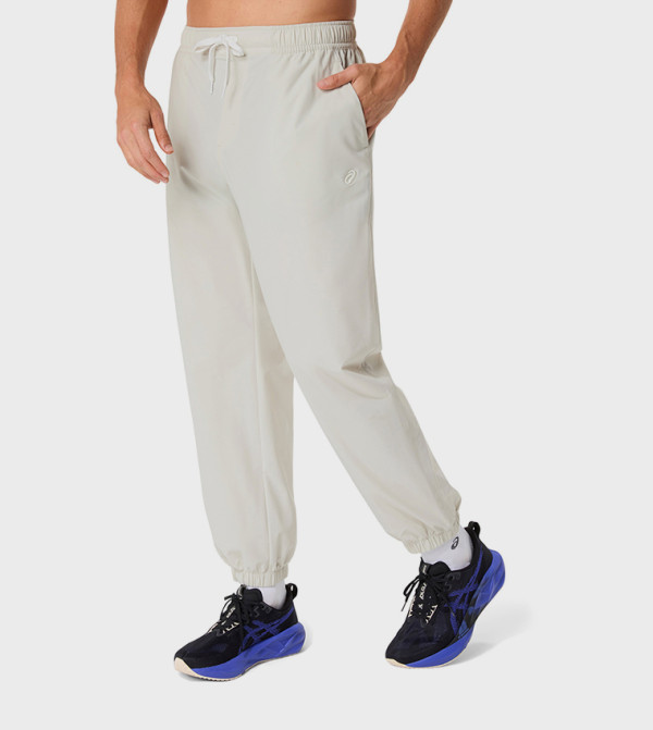 Asics Sportswear - Off White Track Pants & Joggers