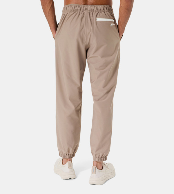 Asics  Track Pants & Joggers - Grey Track Pants & Joggers