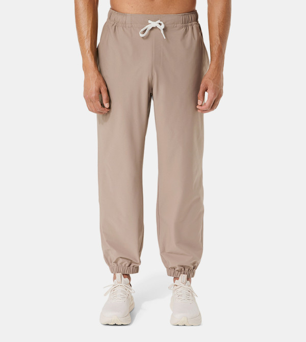 Asics  Track Pants & Joggers - Grey Track Pants & Joggers