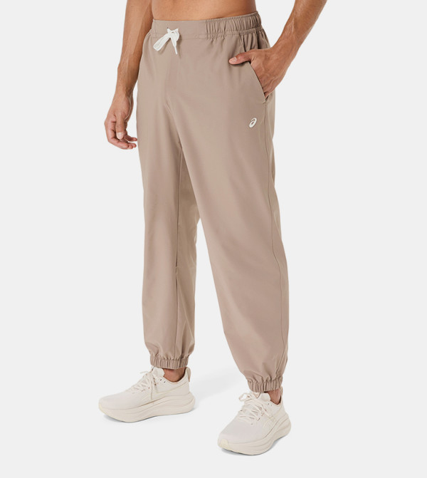 Asics  Track Pants & Joggers - Grey Track Pants & Joggers