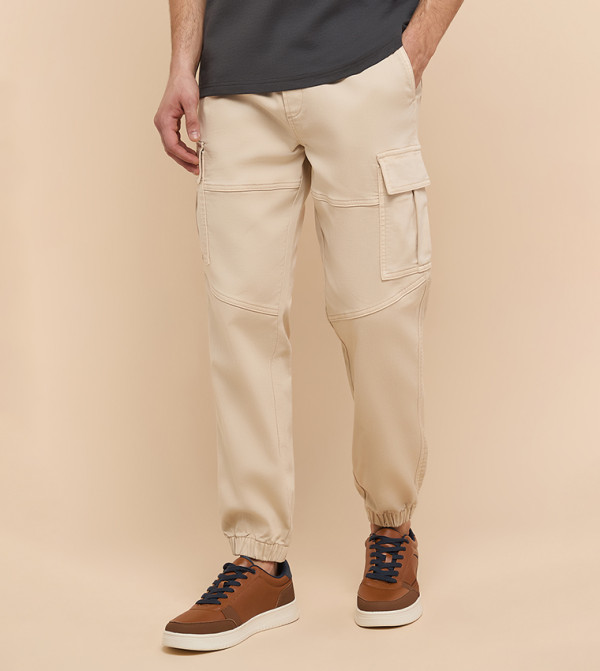 أر آند بي  جينزات واسعة  - بيج Relaxed Jeans
