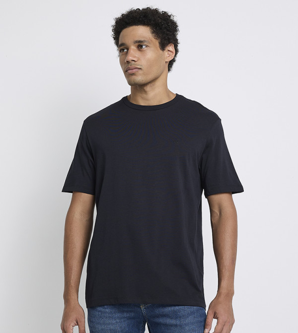 Calvin Klein Jeans  Clothing - Black Round Neck T-Shirts
