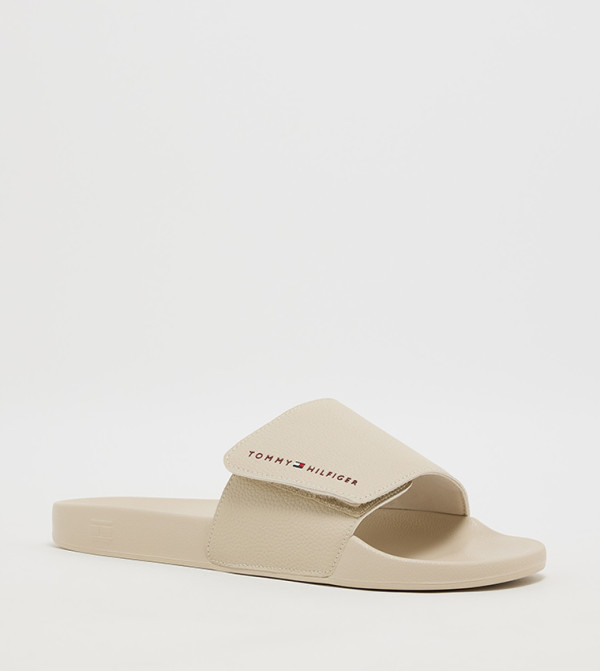 Tommy Hilfiger  Flip flops and Slides - Beige Slides