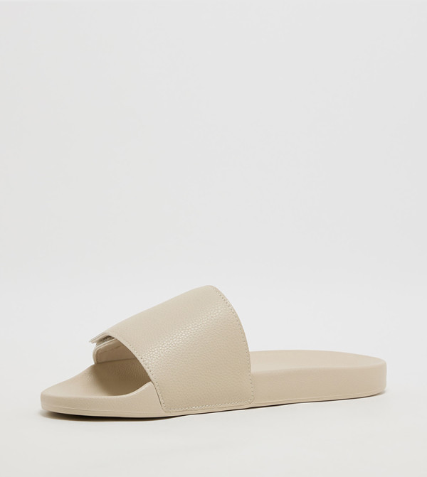 Tommy Hilfiger  Flip flops and Slides - Beige Slides
