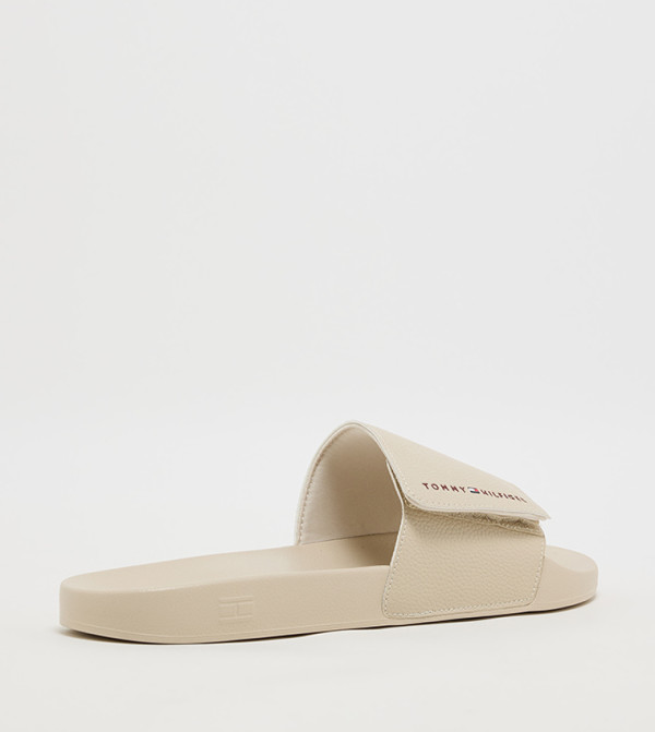 Tommy Hilfiger  Flip flops and Slides - Beige Slides