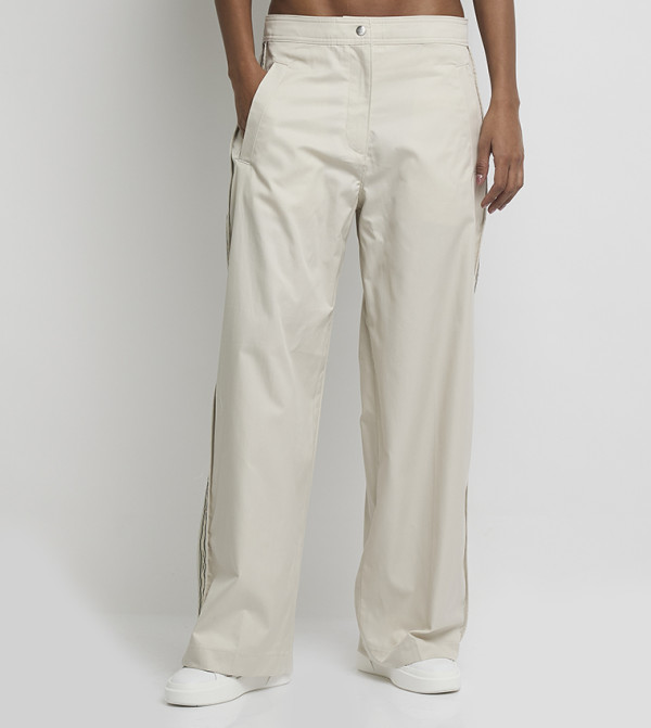 Calvin Klein Jeans  Clothing - Off White Casual Pants