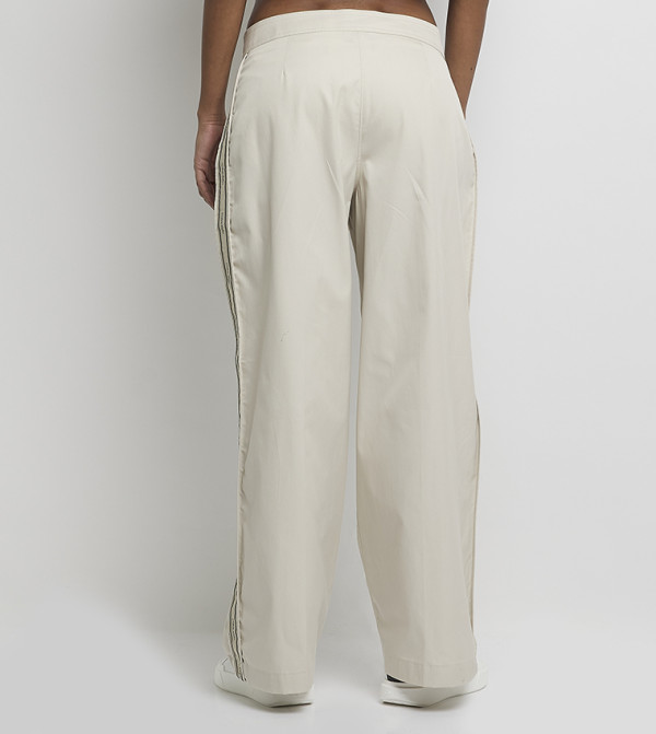 Calvin Klein Jeans  Clothing - Off White Casual Pants