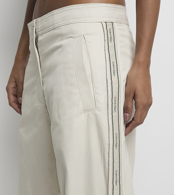Calvin Klein Jeans  Clothing - Off White Casual Pants
