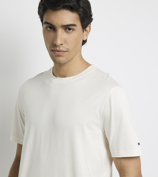 Tommy Hilfiger  Clothing - Yellow Round Neck T-Shirts