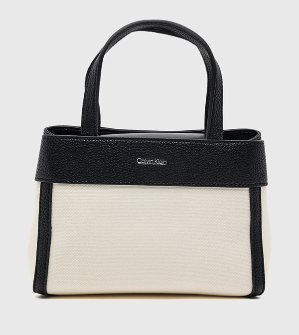 كالفين كلاين كالفين كلاين - كريمي  حقائب يد كبيرة