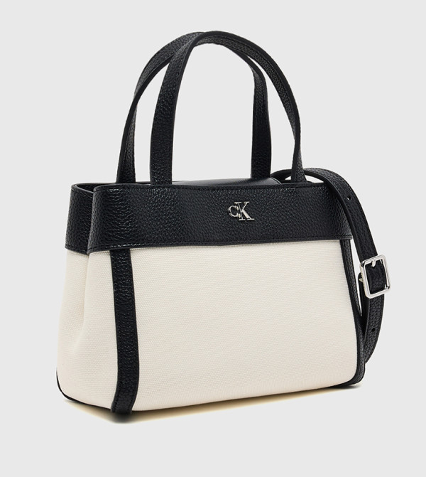 كالفين كلاين كالفين كلاين - كريمي  حقائب يد كبيرة