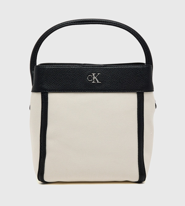Calvin Klein Calvin Klein - Cream Handheld Bags