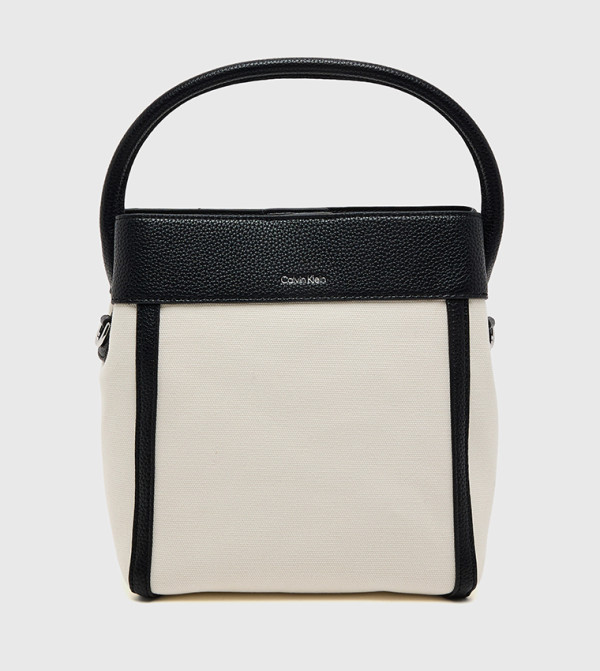 Calvin Klein Calvin Klein - Cream Handheld Bags