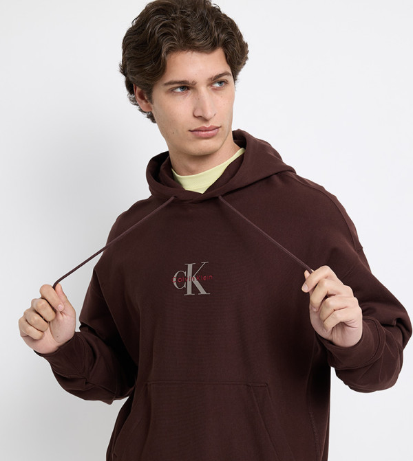 Calvin Klein Jeans  Clothing - Dark Brown Hoodies
