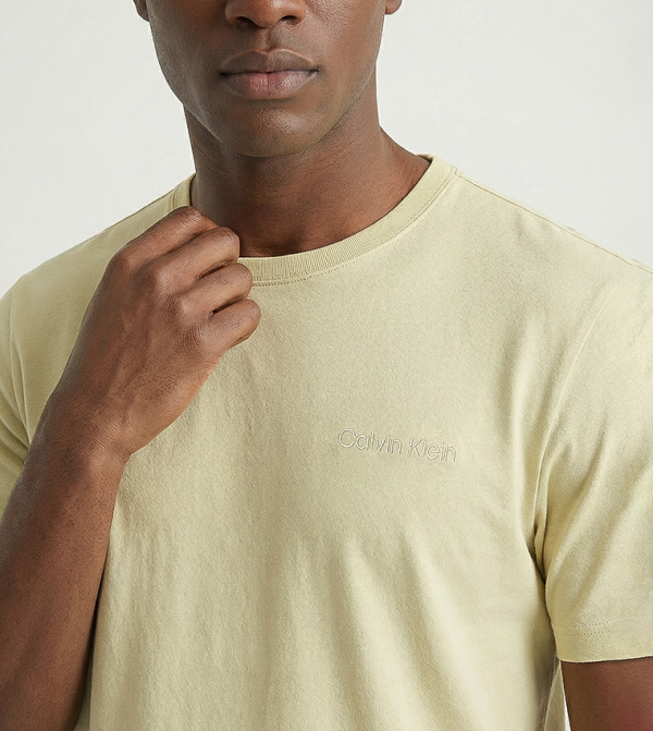 Calvin Klein  Tops  - Yellow Tops