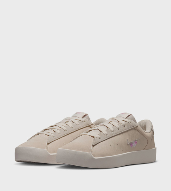 Nike Nike - Beige Low Top