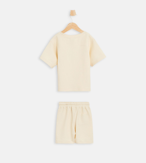 بيبيز آند مور  ملابس - كريمي  "مجموعات الملابس "