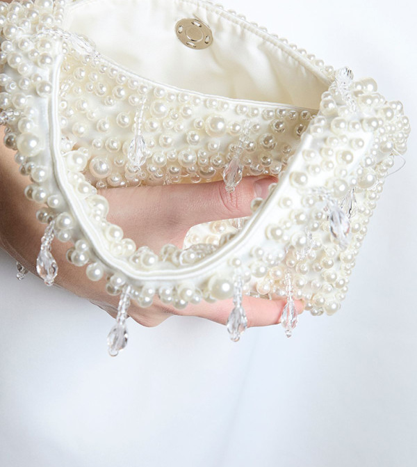 Coast Coast - White Handheld Bags