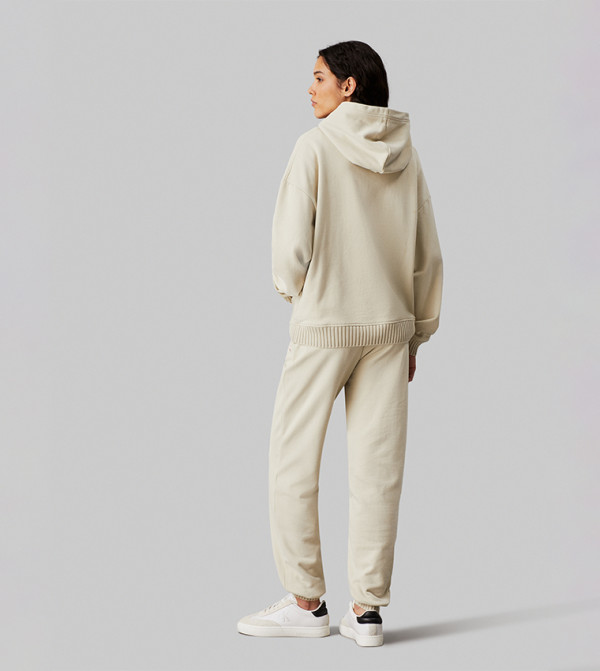 كالفن كلاين جينز  بناطيل مشي وركض - كريمي  Track Pants & Joggers