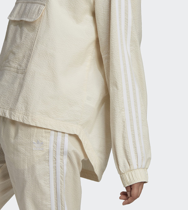 Adidas  Track Jackets - Beige Track Jackets