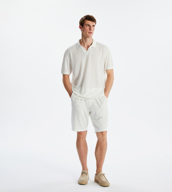 اٍل سي واي كيكي  ملابس - بيج قمصان بولو