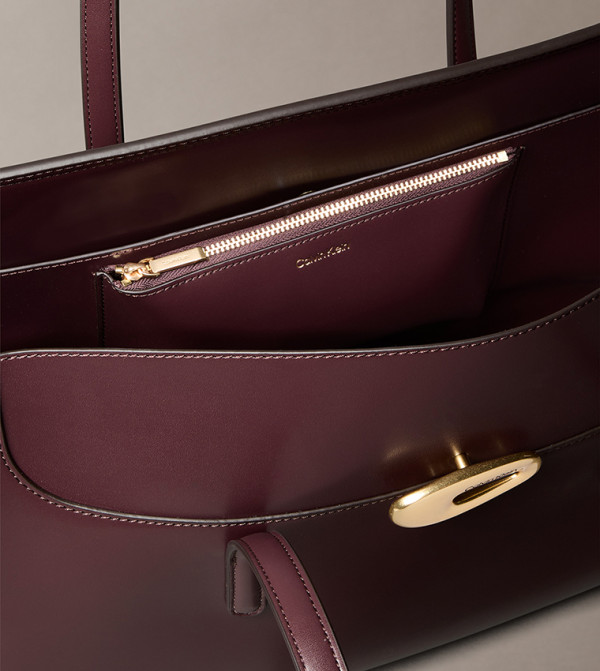 كالفين كلاين كالفين كلاين - بني محمر  حقائب يد كبيرة