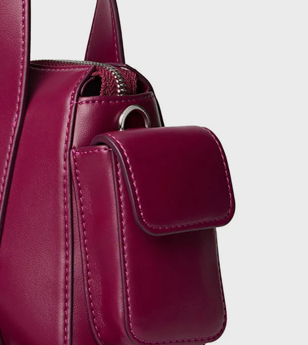 Calvin Klein Calvin Klein - Magenta Handheld Bags