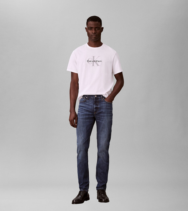 كالفين كلاين  بناطيل جينز - أزرق Tapered Jeans