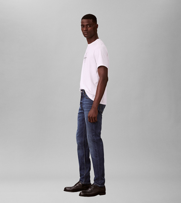 كالفين كلاين  بناطيل جينز - أزرق Tapered Jeans