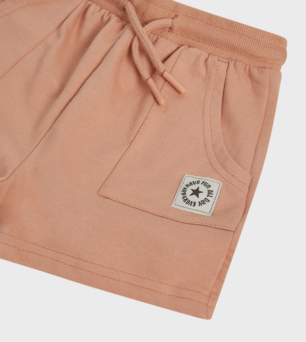 BABIES & MORE  - Peach Shorts