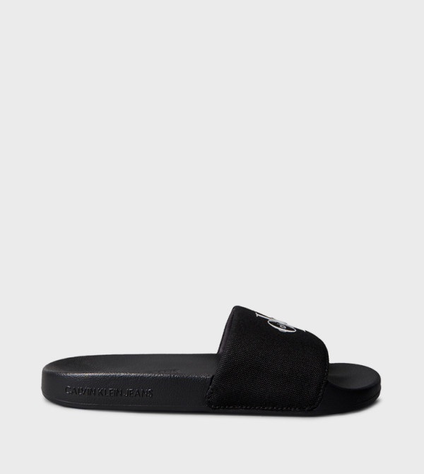 Calvin Klein  Flip flops and Slides - Black Slides