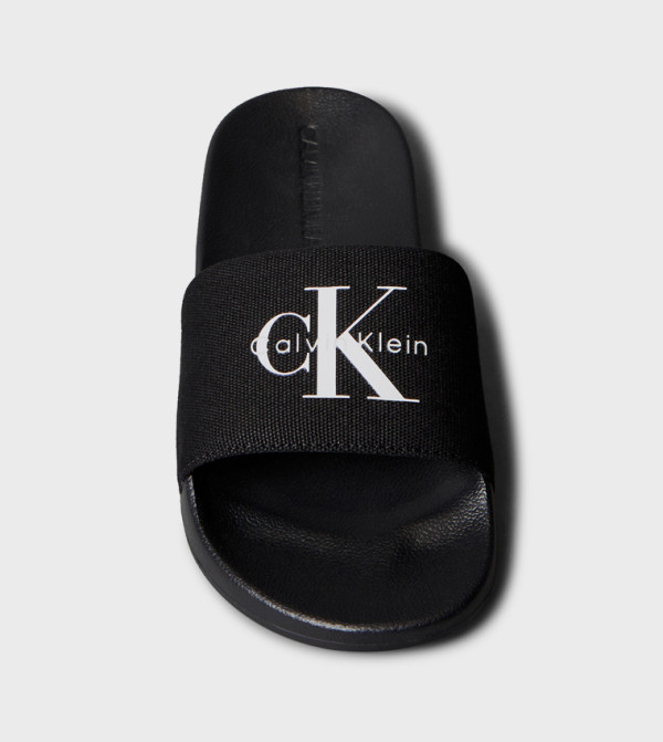 Calvin Klein  Flip flops and Slides - Black Slides