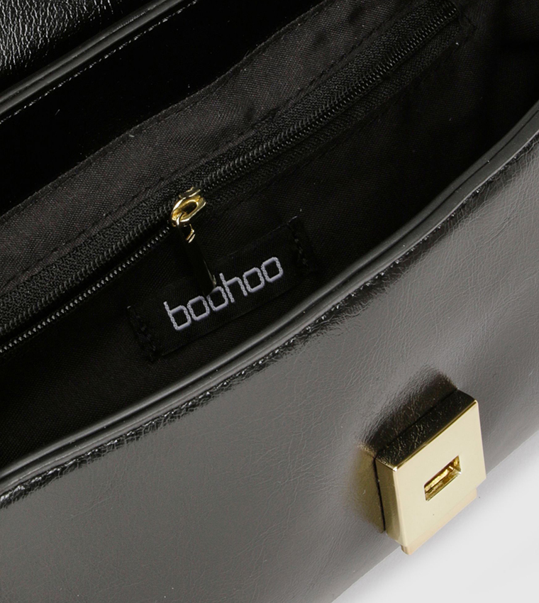 حقيبة كتف ذهبية بمشبك أمامي