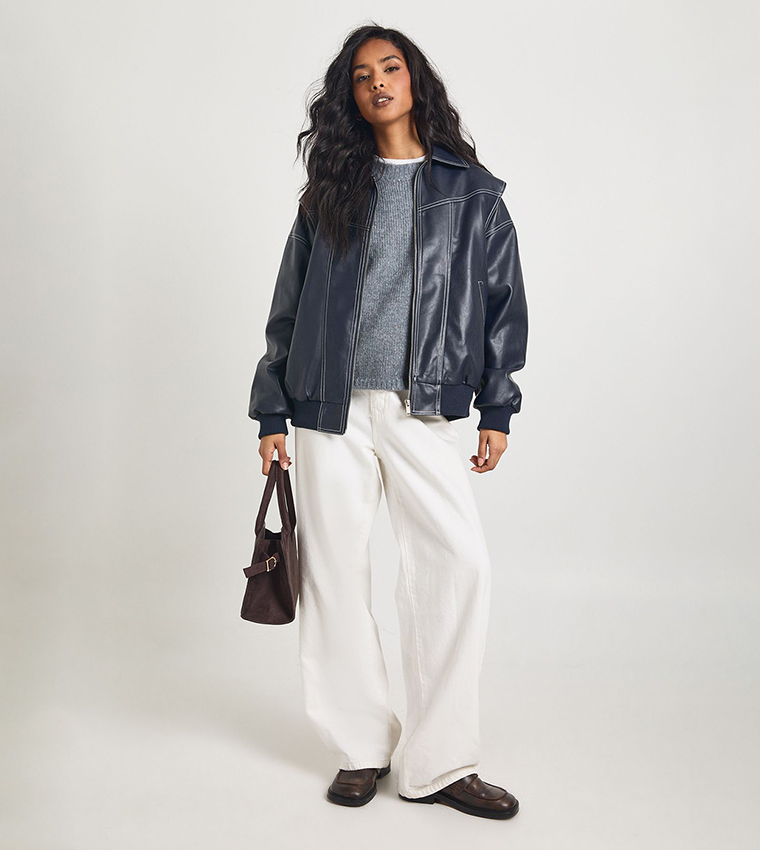 جاكيت بومبر جلد صناعي بخياطة متباينة