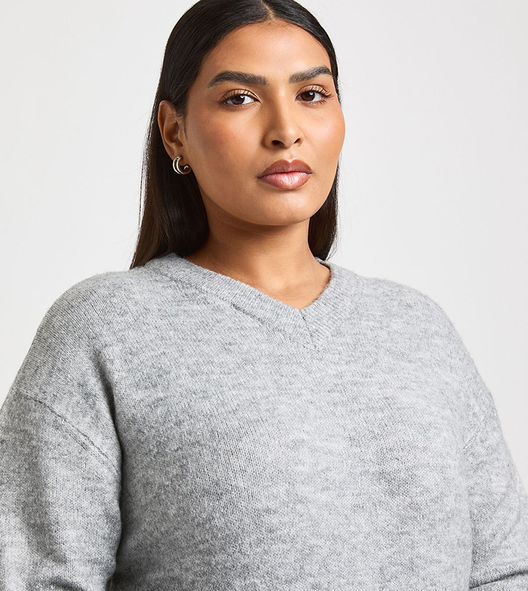 Curve Knitted V-Neck Sweater