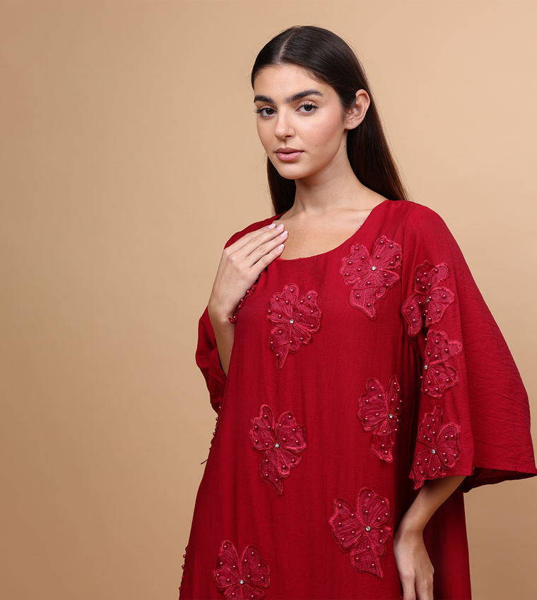 جلابية مزينة بورود وكم فلير 