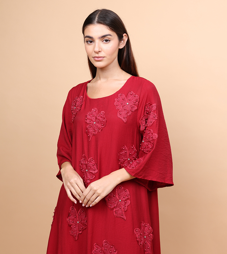 جلابية مزينة بورود وكم فلير 