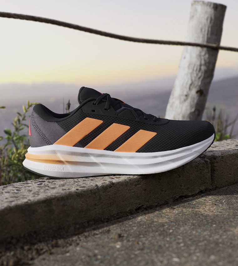 حذاء جري جالاكسي 7 مخطط برباط