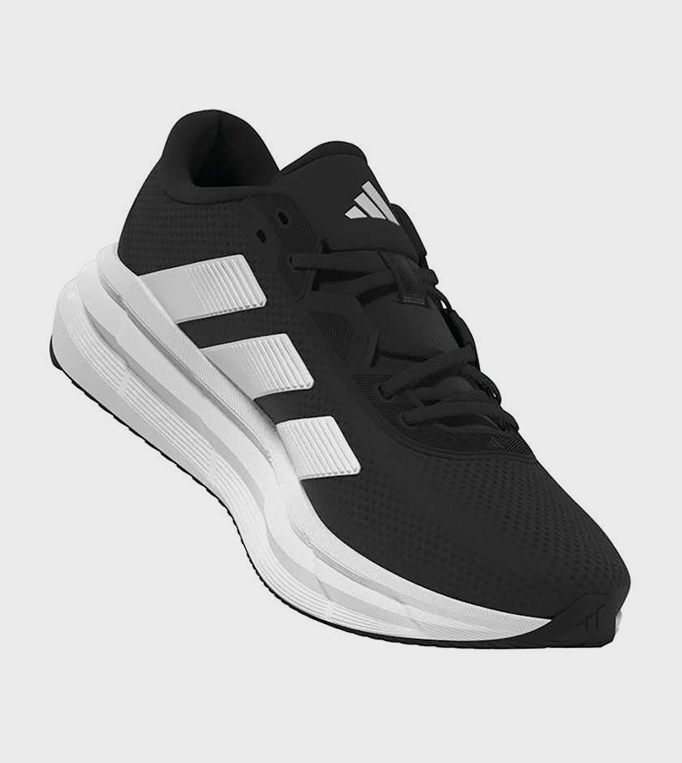 حذاء جري جالاكسي واسع جدًا مخطط برباط