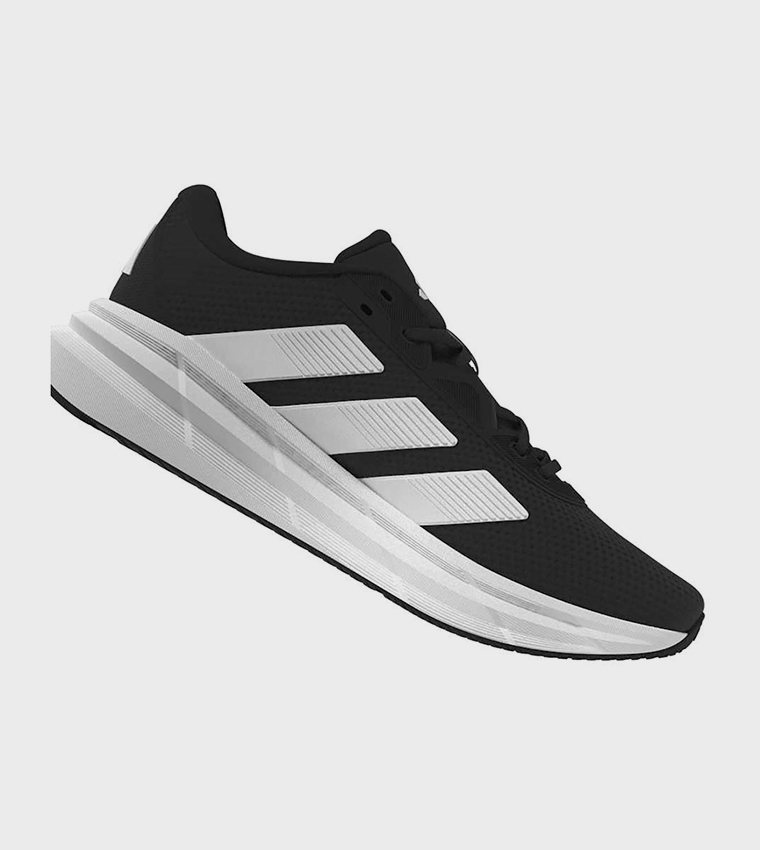 حذاء جري جالاكسي واسع جدًا مخطط برباط