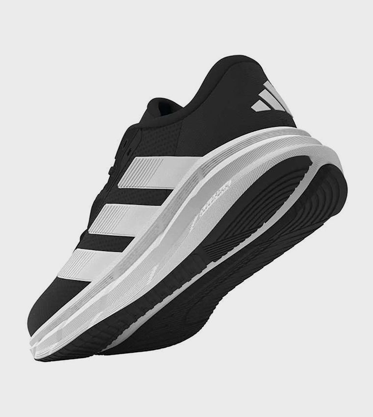 حذاء جري جالاكسي واسع جدًا مخطط برباط