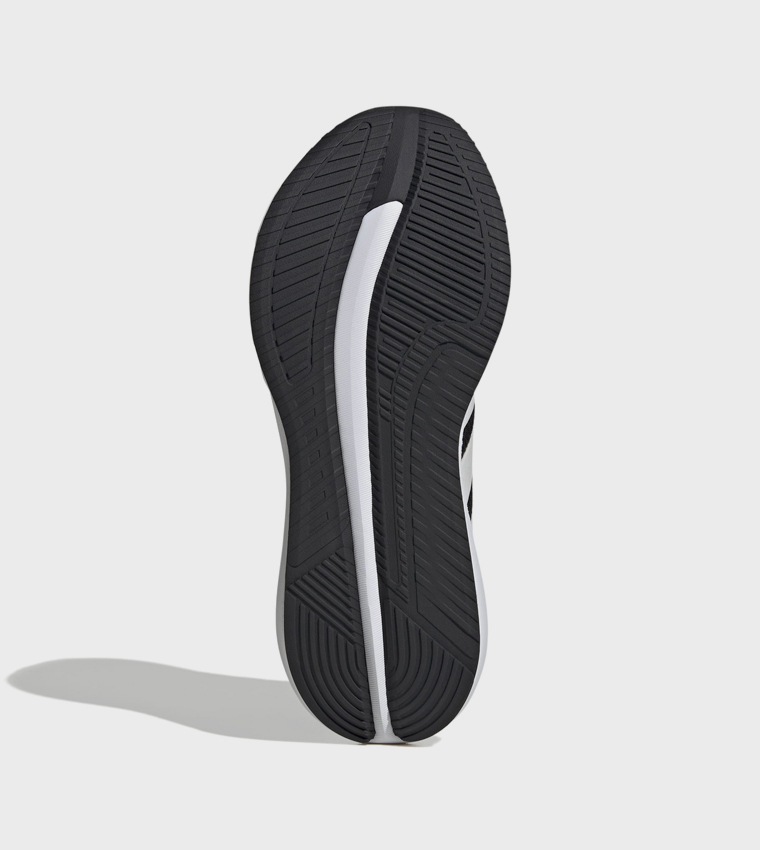 حذاء جري جالاكسي واسع جدًا مخطط برباط