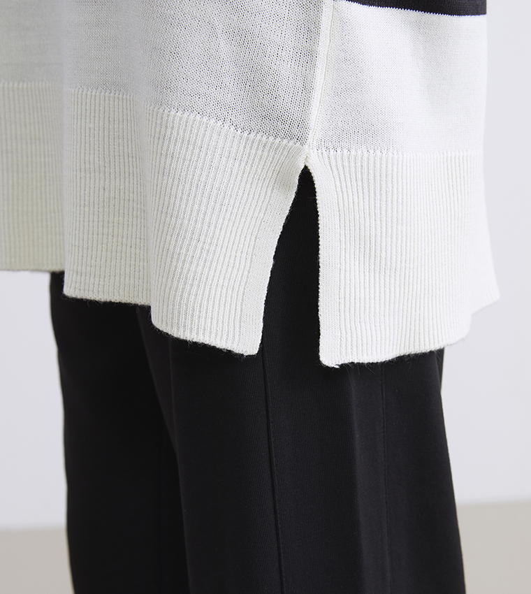 سويتر تونيك مخطط برقبة عالية وهمية