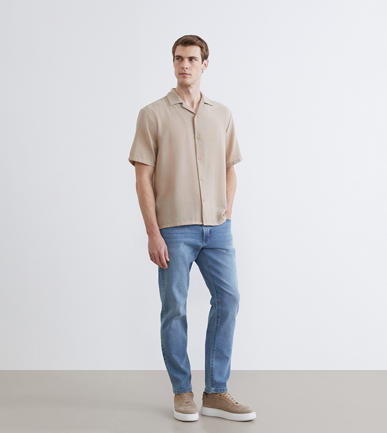 Washed Mid-Rise Jeans