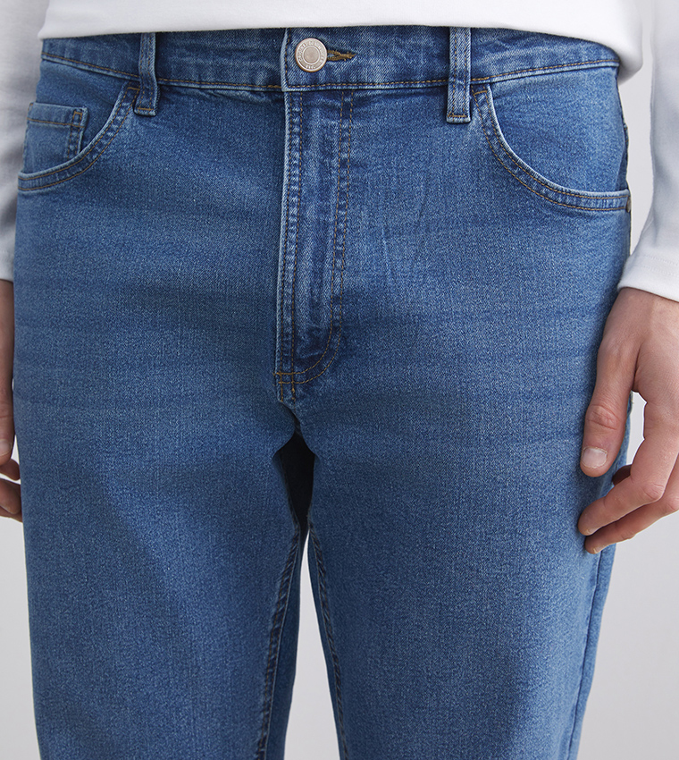 Washed Mid Rise Straight Fit Jeans