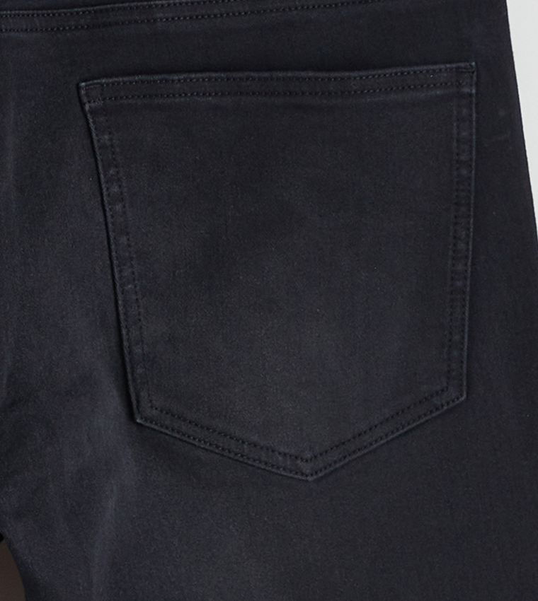 بنطلون جينز 750 رجالي مغسول بخصر متوسط بقصة ضيقة