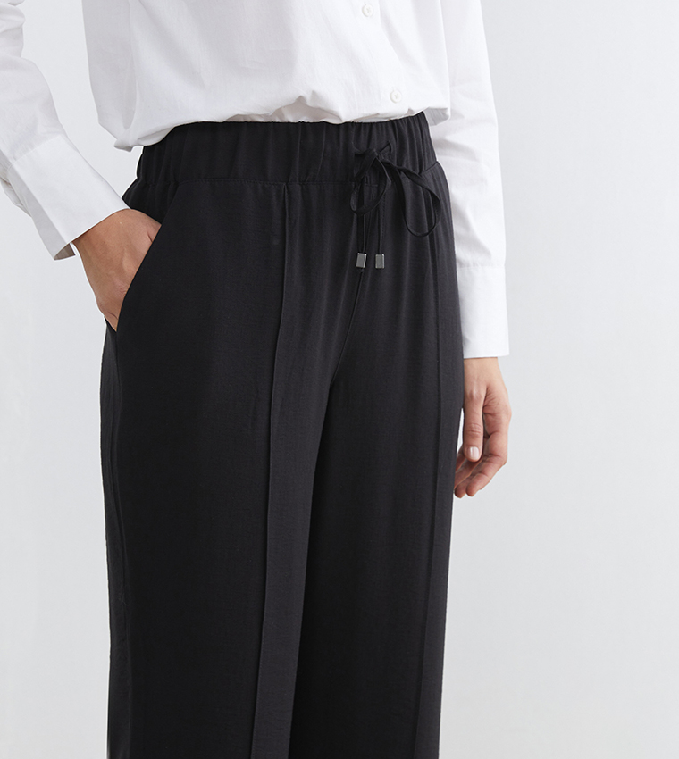 Solid Drawstring Waist Flared Trousers