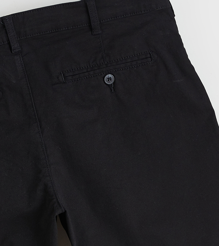 Solid Mid Rise Slim Fit Chinos